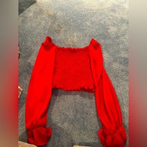 Cute blouse. Red and sinching. Worn once.